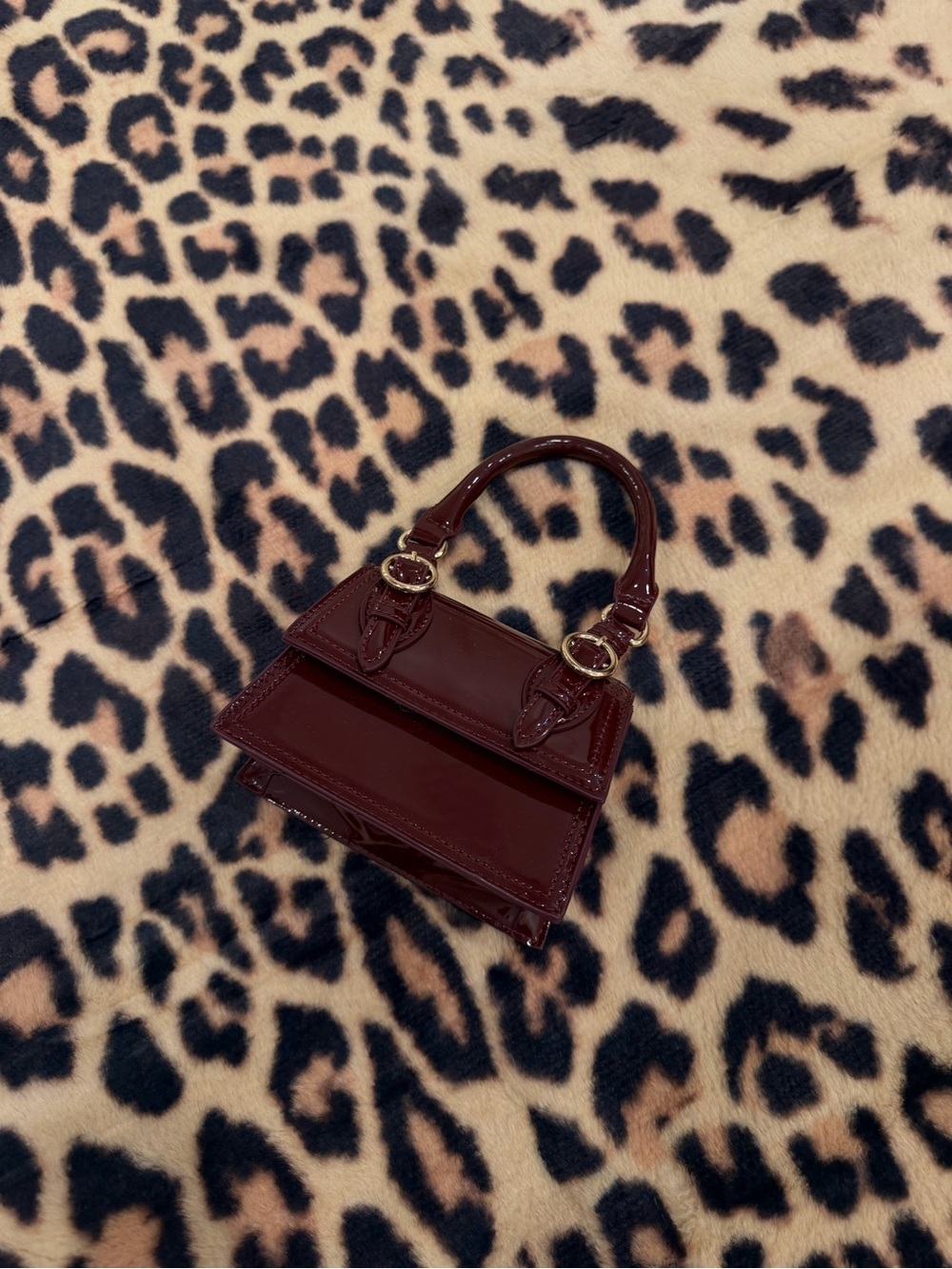 Call it spring Patent Mini Top-Handle Bag in Deep Burgundy